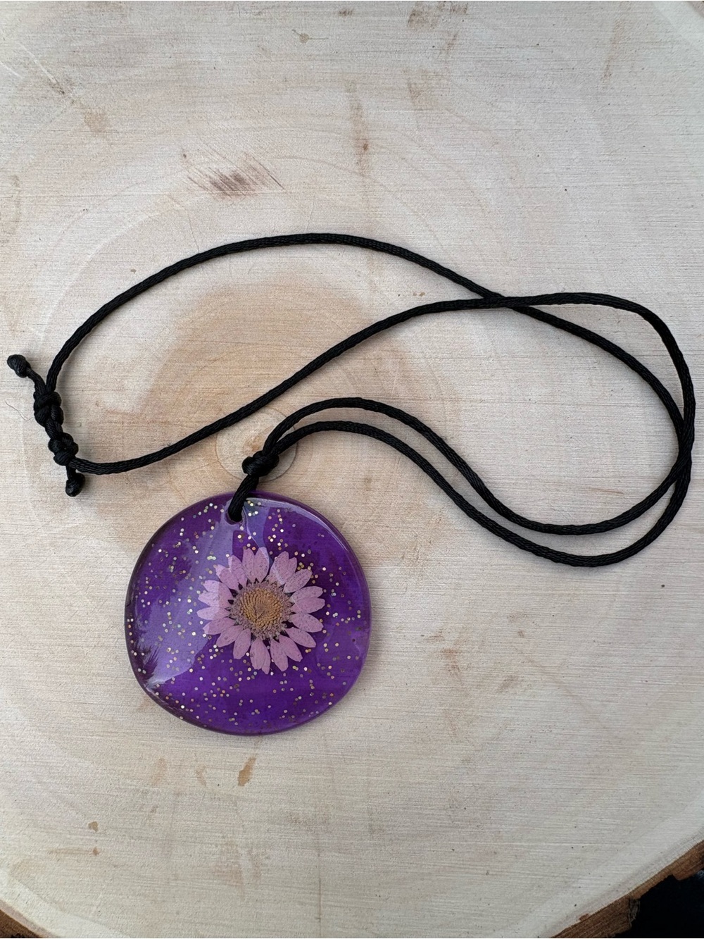 Artisan made pressed flower purple glitter resin pendant necklace